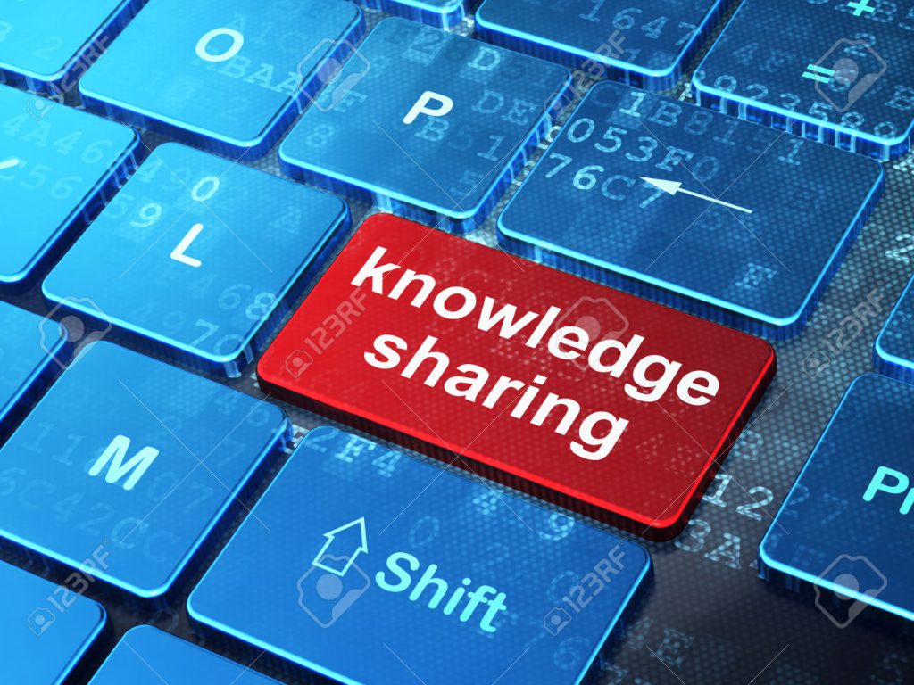 Education concept: Knowledge Sharing on computer keyboard background